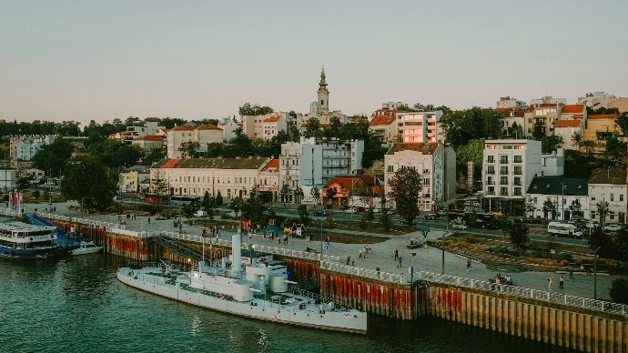 A harbor with boats and a city in the background
